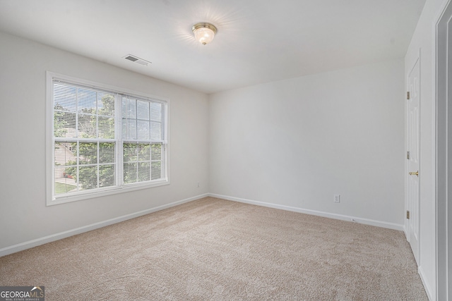 7280 Wright Dr, Atlanta, GA 30349 - carpeted empty room featuring baseboards
