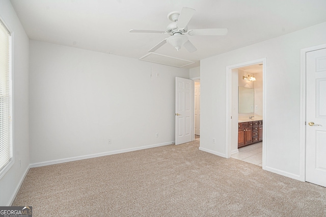 7280 Wright Dr, Atlanta, GA 30349 - unfurnished bedroom with attic access, light carpet, multiple windows, and ensuite bathroom