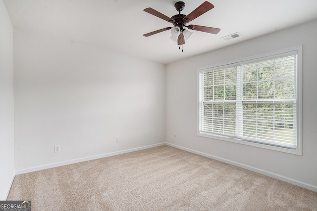 7280 Wright Dr, Atlanta, GA 30349 - unfurnished room with carpet and a ceiling fan