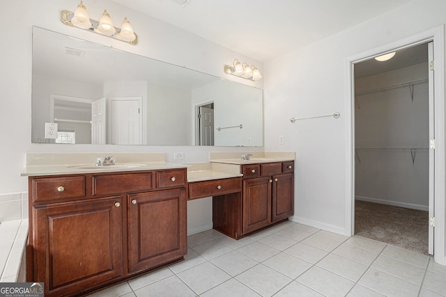 7280 Wright Dr, Atlanta, GA 30349 - full bath featuring double vanity, tile patterned flooring, and a spacious closet