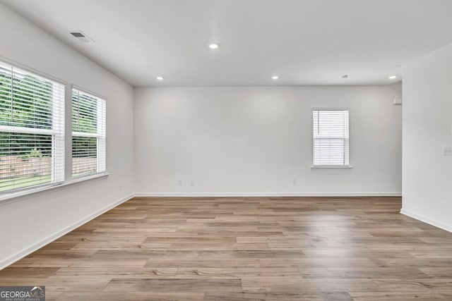 630 Evergreen Rd, Winder, GA 30680 - unfurnished room featuring light wood finished floors, recessed lighting, and baseboards