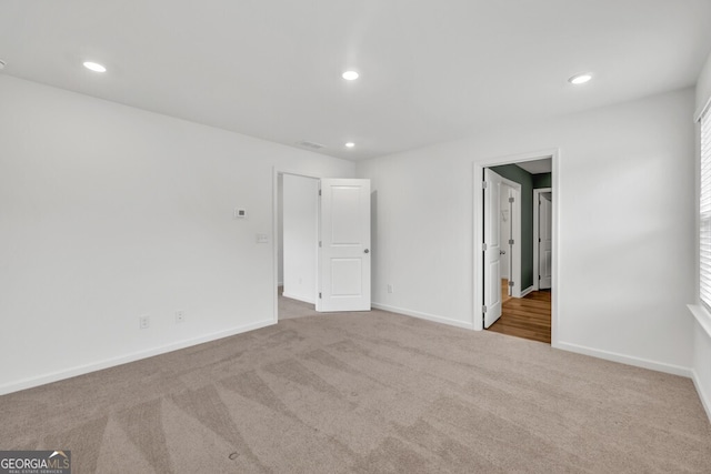630 Evergreen Rd, Winder, GA 30680 - unfurnished bedroom with carpet flooring, baseboards, and recessed lighting