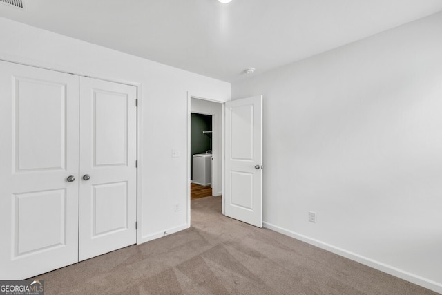 630 Evergreen Rd, Winder, GA 30680 - unfurnished bedroom featuring carpet, baseboards, and a closet