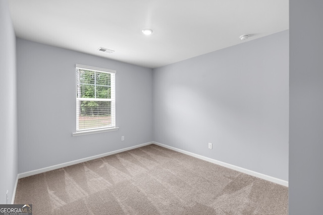 630 Evergreen Rd, Winder, GA 30680 - carpeted spare room featuring baseboards and a smoke detector