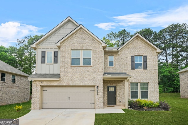 116 Cabin Way, Hampton, GA 30228 - craftsman inspired home featuring an attached garage, driveway, board and batten siding, a front lawn, and brick siding