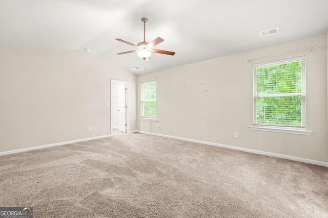 116 Cabin Way, Hampton, GA 30228 - empty room with ceiling fan, carpet, vaulted ceiling, and baseboards