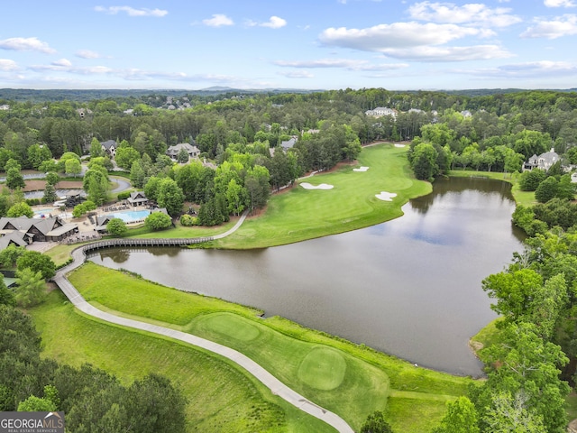 drone / aerial view of a large body of water and a local golf course