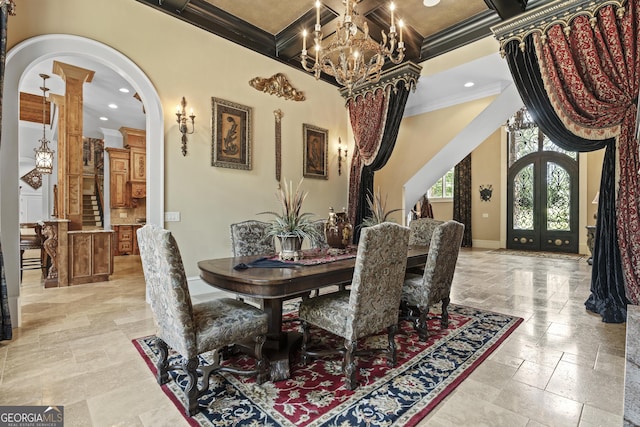 dining space with crown molding, arched walkways, baseboards, a chandelier, and coffered ceiling