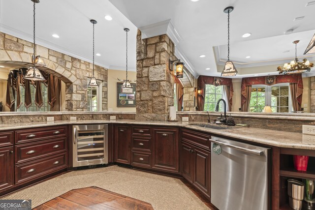 kitchen with dishwasher, beverage cooler, crown molding, reddish brown cabinets, and a sink