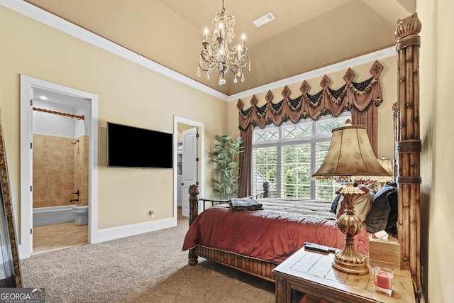 carpeted bedroom with ornamental molding, a chandelier, ensuite bath, and baseboards
