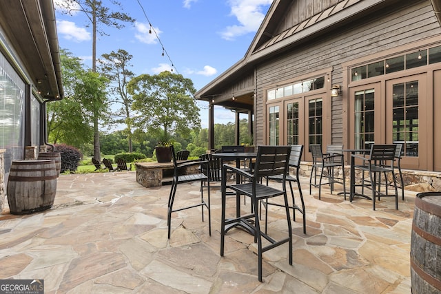 view of patio / terrace with french doors and outdoor dining area