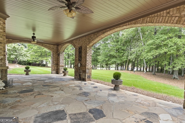 view of patio featuring ceiling fan
