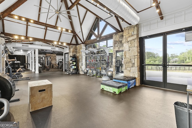 gym with high vaulted ceiling and beamed ceiling