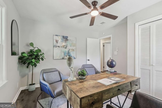 office area featuring wood finished floors, a ceiling fan, and baseboards