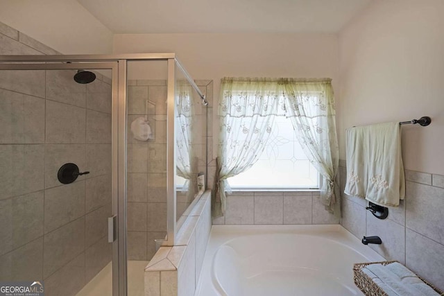 2209 Cedar Place Ct, Snellville, GA 30078 - bathroom featuring a stall shower and a garden tub