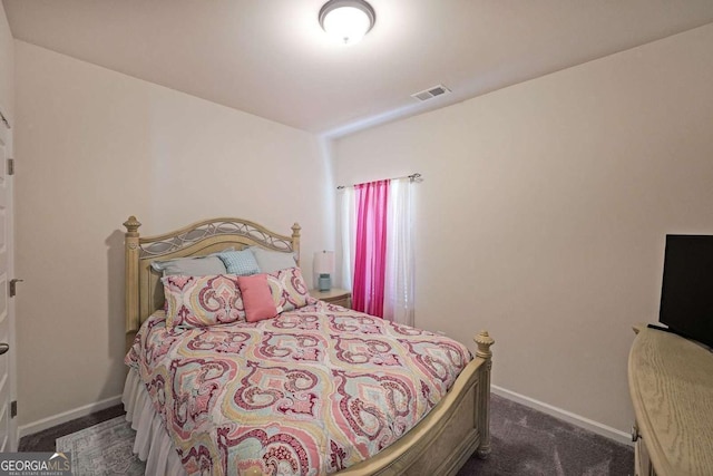 2209 Cedar Place Ct, Snellville, GA 30078 - bedroom with dark carpet and baseboards