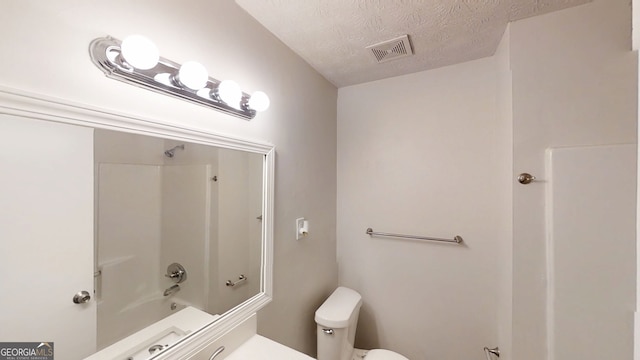 3512 Valley Chase Ct, Lithonia, GA 30038 - full bath featuring toilet, a textured ceiling, and bathtub / shower combination