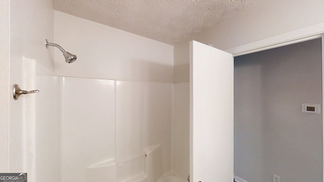 3512 Valley Chase Ct, Lithonia, GA 30038 - full bath featuring a shower and a textured ceiling