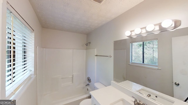 3512 Valley Chase Ct, Lithonia, GA 30038 - full bath with a textured ceiling, washtub / shower combination, toilet, and vanity