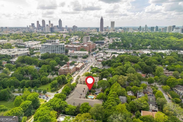 drone / aerial view of a skyline view and a tree filled landscape