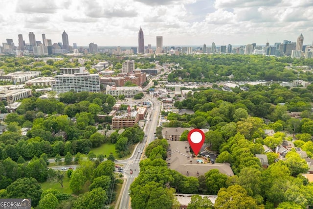 bird's eye view of a skyline view and a tree filled landscape