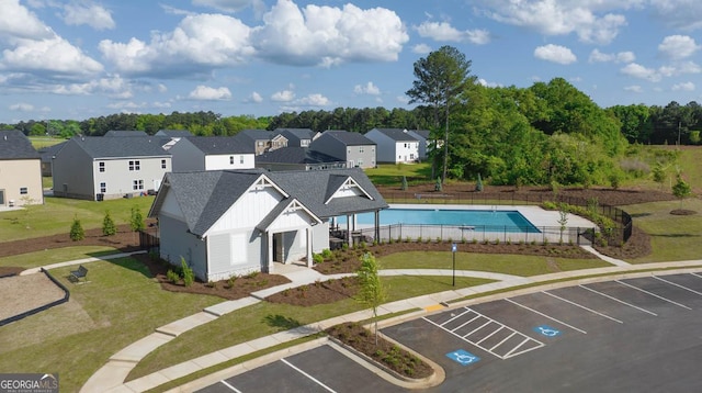 aerial perspective of suburban area with a pool area