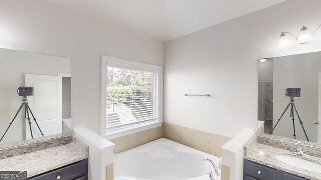 900 Ellesmere Pt, Mcdonough, GA 30253 - full bathroom with vanity and a garden tub
