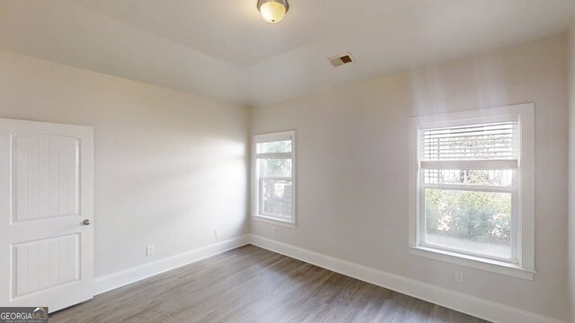 900 Ellesmere Pt, Mcdonough, GA 30253 - spare room with wood finished floors