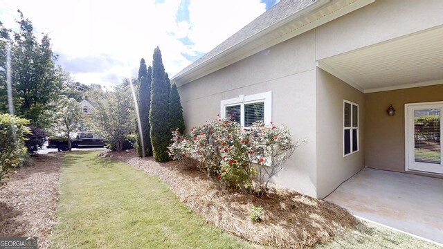 900 Ellesmere Pt, Mcdonough, GA 30253 - view of grassy yard with a patio