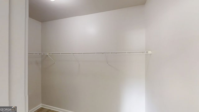 900 Ellesmere Pt, Mcdonough, GA 30253 - spacious closet with wood finished floors