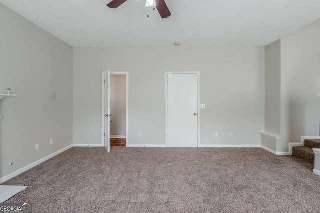 4889 Hidden Creek Pl, Decatur, GA 30035 - carpeted empty room featuring ceiling fan and stairs