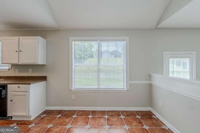 4889 Hidden Creek Pl, Decatur, GA 30035 - unfurnished dining area with plenty of natural light and tile patterned floors