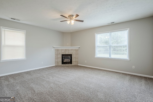 8826 Lakecrest Way, Union City, GA 30291 - unfurnished living room with a ceiling fan, carpet, and a fireplace