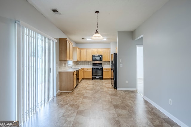8826 Lakecrest Way, Union City, GA 30291 - kitchen featuring black appliances, light brown cabinets, decorative backsplash, light countertops, and pendant lighting