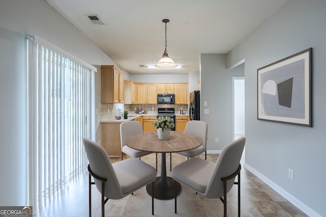 8826 Lakecrest Way, Union City, GA 30291 - dining area with healthy amount of natural light