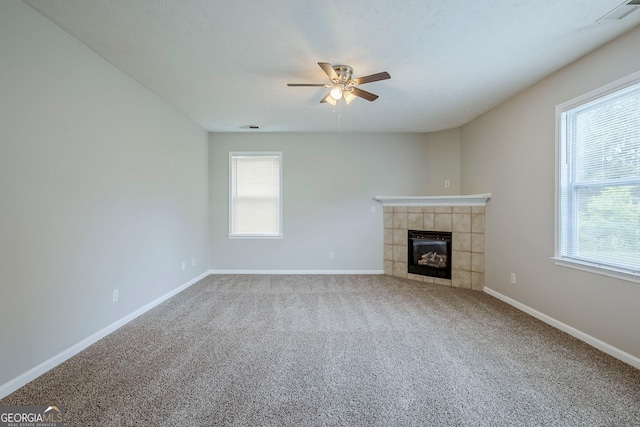 8826 Lakecrest Way, Union City, GA 30291 - unfurnished living room featuring a fireplace, a ceiling fan, and carpet