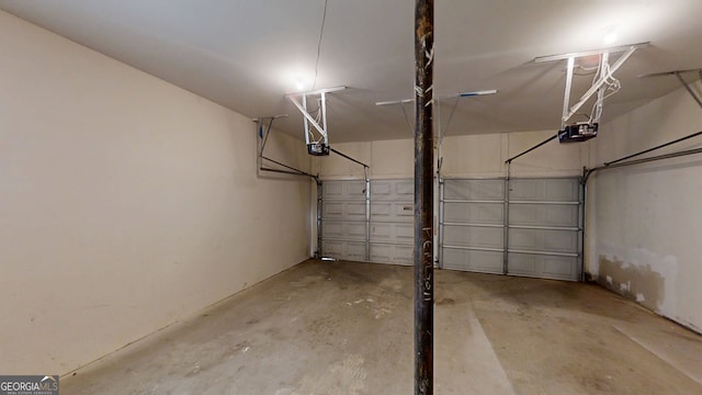 4912 Lightwood Ct NW, Acworth, GA 30102 - garage featuring a garage door opener