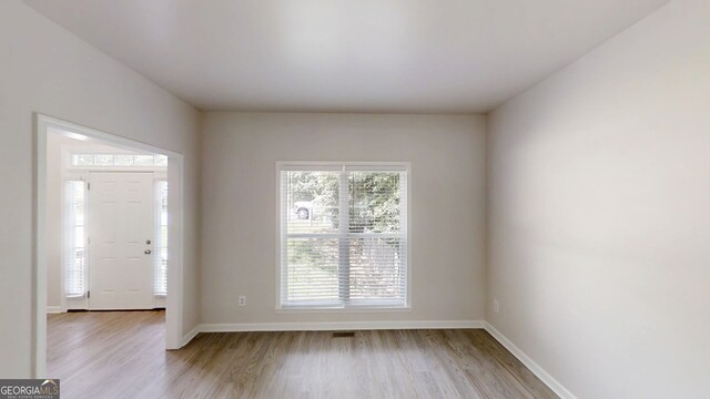 4912 Lightwood Ct NW, Acworth, GA 30102 - foyer featuring light wood-style flooring and baseboards