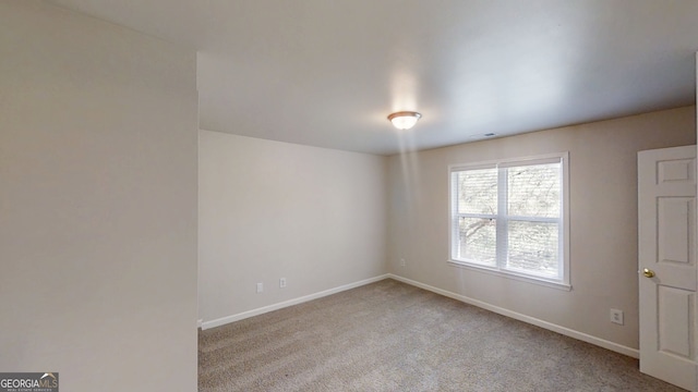 4912 Lightwood Ct NW, Acworth, GA 30102 - carpeted spare room with baseboards