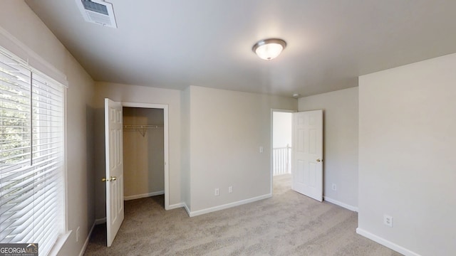 4912 Lightwood Ct NW, Acworth, GA 30102 - unfurnished bedroom with carpet floors, baseboards, and a closet