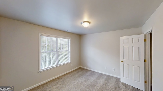 4912 Lightwood Ct NW, Acworth, GA 30102 - carpeted empty room featuring baseboards