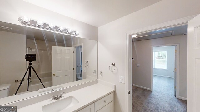 4912 Lightwood Ct NW, Acworth, GA 30102 - full bath featuring vanity, baseboards, and toilet