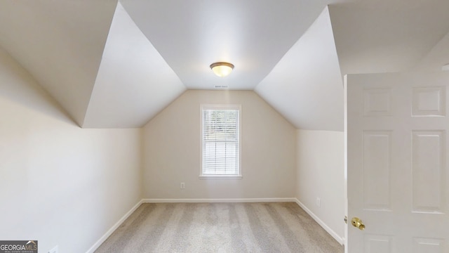 4912 Lightwood Ct NW, Acworth, GA 30102 - additional living space featuring baseboards, vaulted ceiling, and light carpet