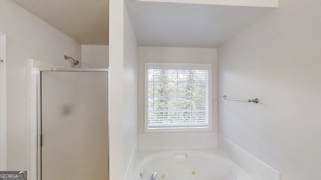 4912 Lightwood Ct NW, Acworth, GA 30102 - bathroom featuring a stall shower and a whirlpool tub