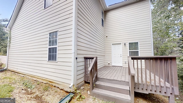 4912 Lightwood Ct NW, Acworth, GA 30102 - view of exterior entry with a deck