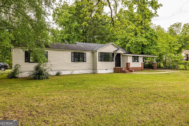 view of front facade with crawl space, a front yard, and roof with shingles