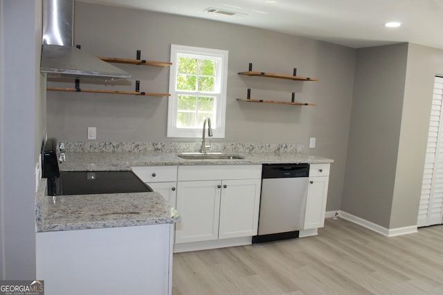 kitchen with stainless steel dishwasher, ventilation hood, open shelves, a sink, and light wood-type flooring