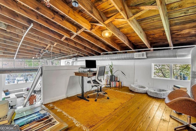 office space featuring hardwood / wood-style flooring and wood ceiling