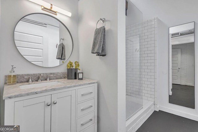 full bath featuring a shower stall and vanity