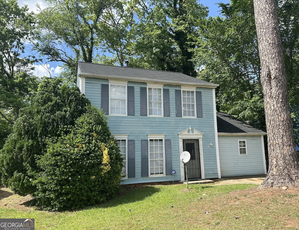 4981 Millstone Walk, Stone Mountain, GA 30088 - colonial-style house featuring a front yard